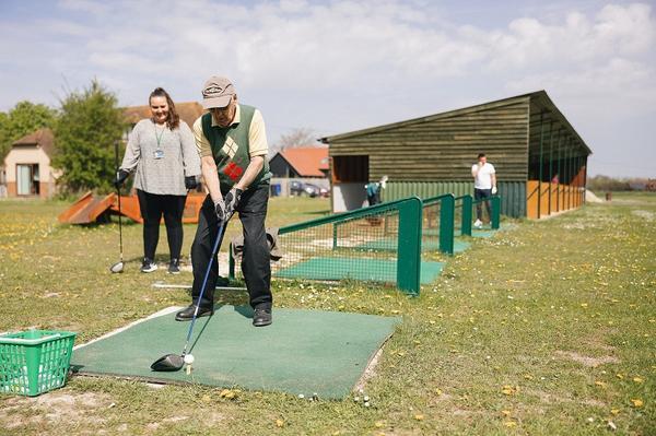 Walfinch Oxford takes client to the driving range