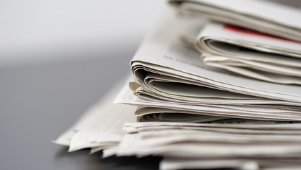 closeup-shot-several-newspapers-stacked-top-each-other - medium.jpg